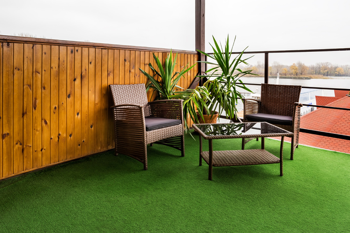 How to Use Fake Grass to Make Your Balcony Feel Like a Garden