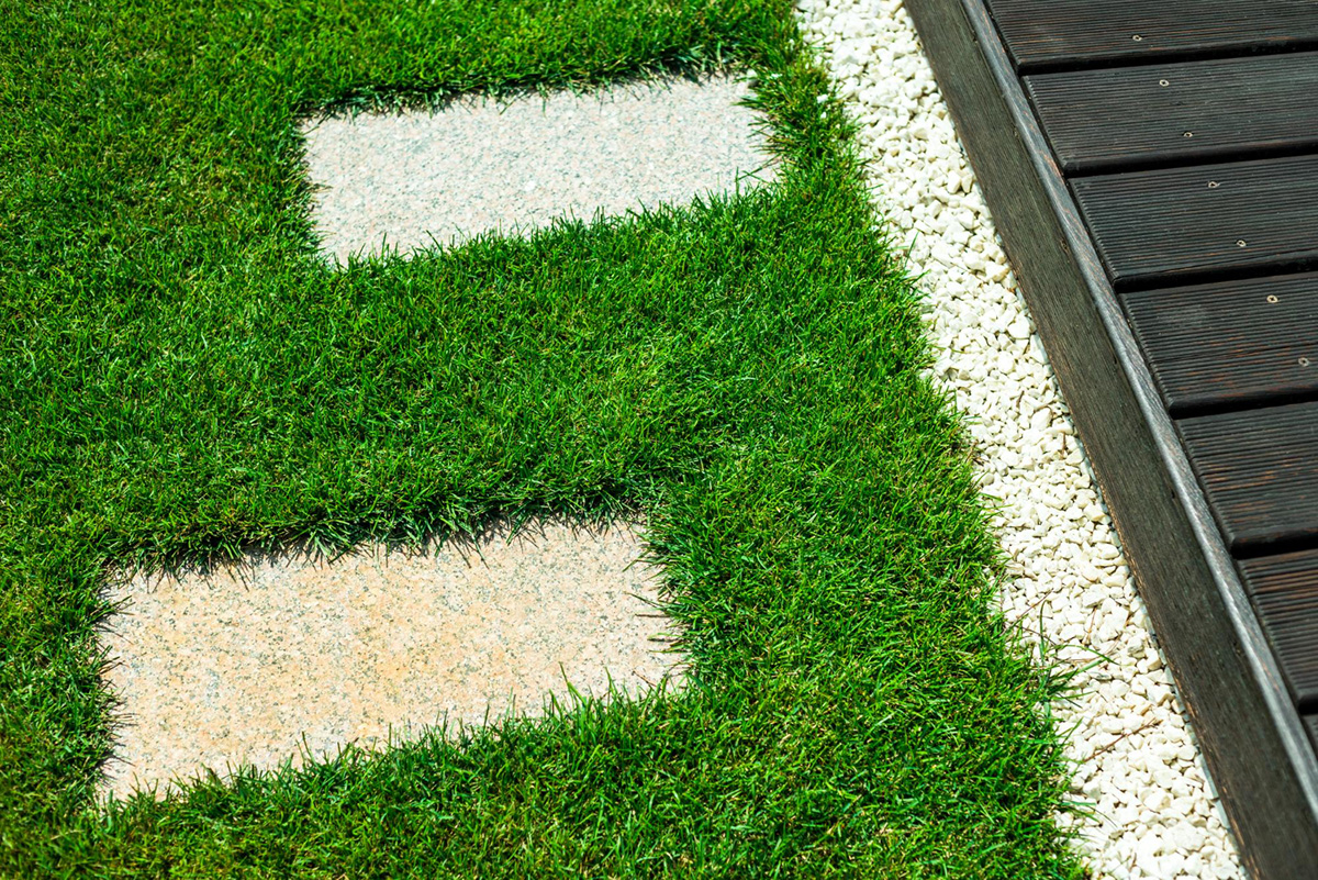 Tips for Installing Fake Grass Against a Patio Edge