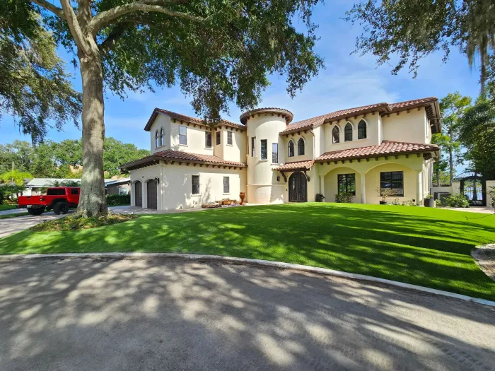 Charming home with artificial grass lawn